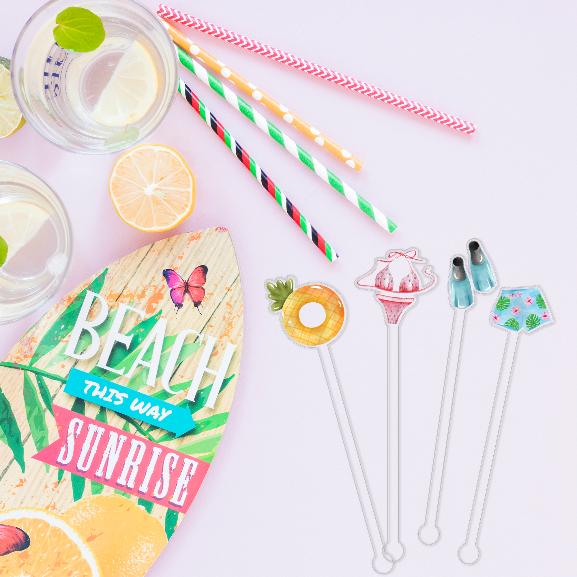 Feelin' Fin-Tastic swizzle stick set styled for a pool party celebration