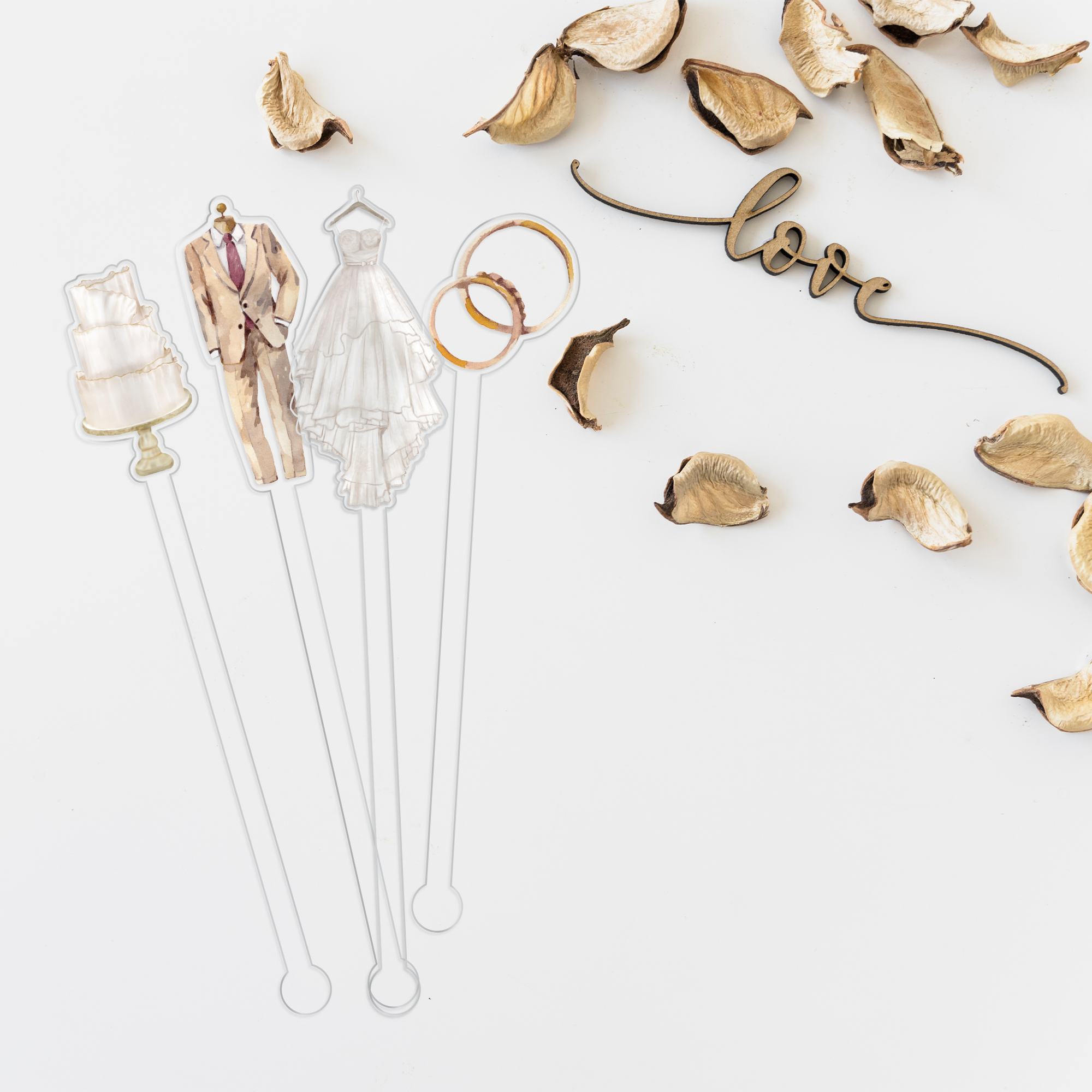 Let's Get Married swizzle stick set styled for a wedding celebration