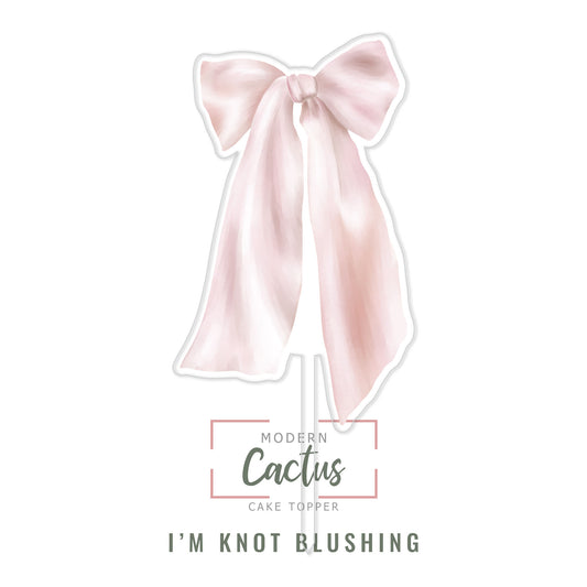 I'm Knot Blushing cake topper design displayed as a clean digital artwork mockup.