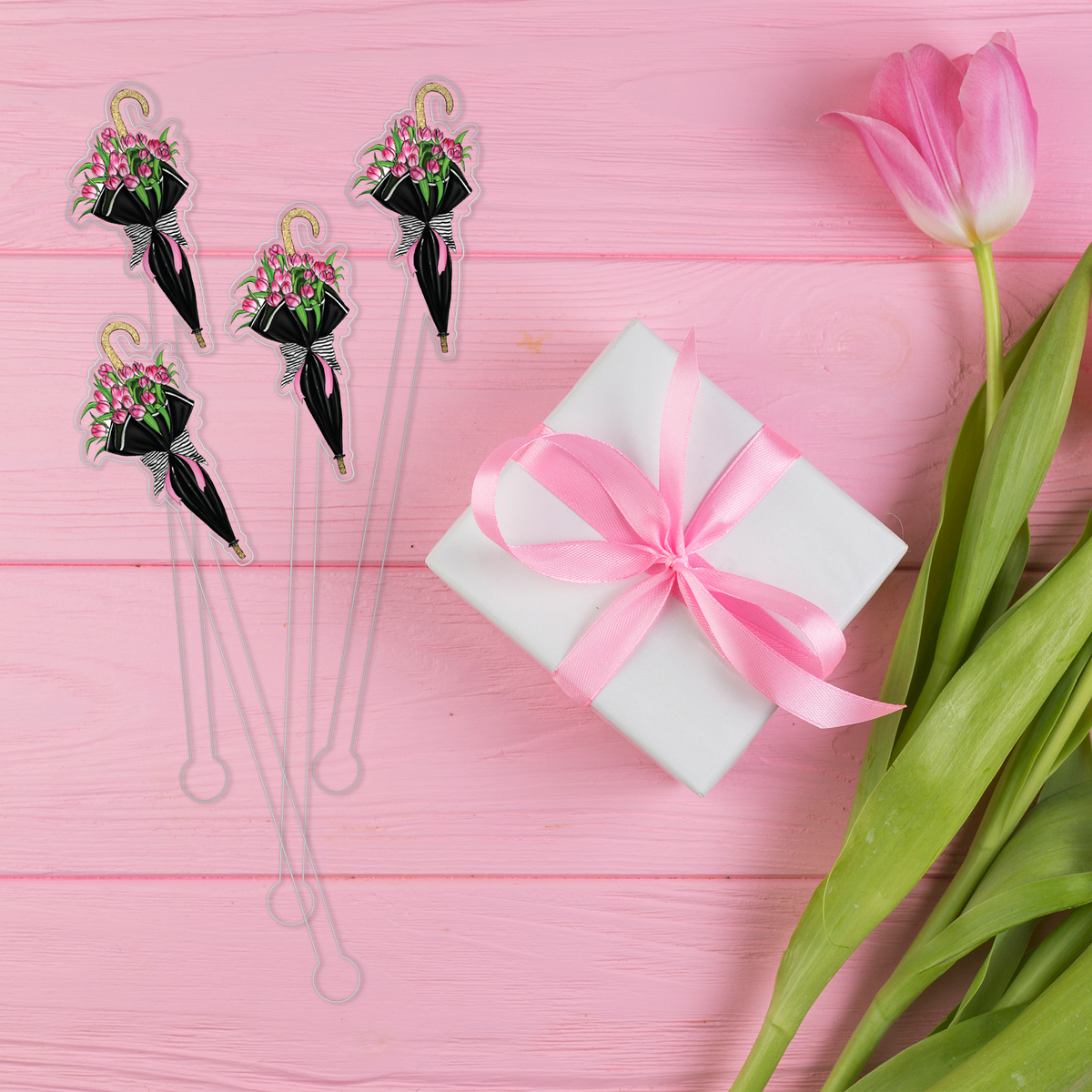 A Budding Romance swizzle stick set styled for a garden party celebration