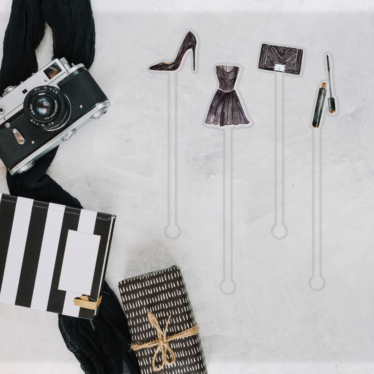 Black to Basics swizzle stick set styled for a cocktail party celebration