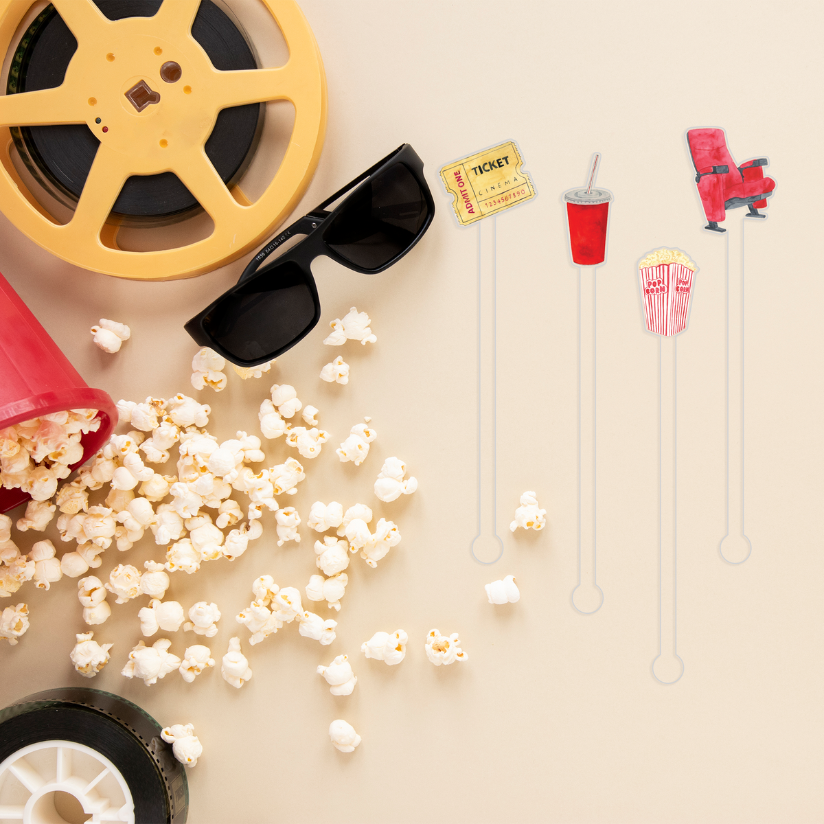 Here For The Snacks swizzle stick set styled for a movie night celebration