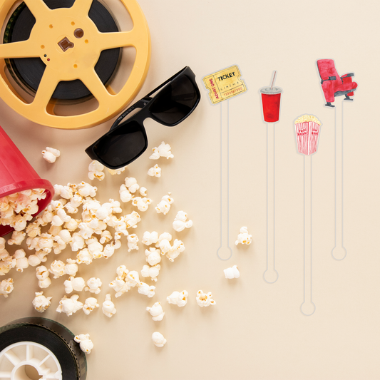 Here For The Snacks swizzle stick set styled for a movie night celebration