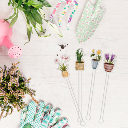 I Wet My Plants swizzle stick set styled for a garden party celebration