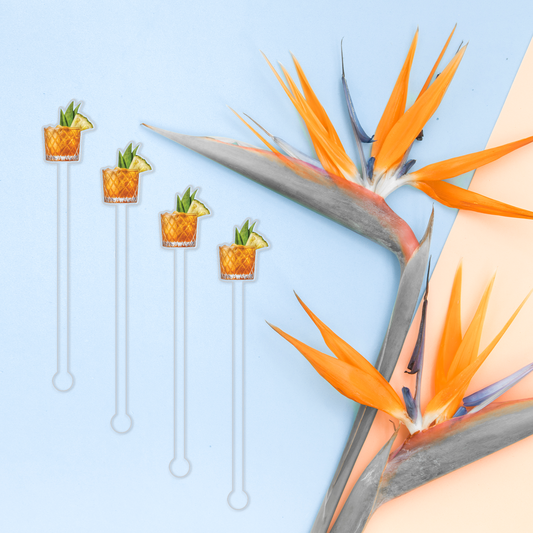 Jungle Bird swizzle stick set in styled cocktail drink on home bar or entertaining setup.