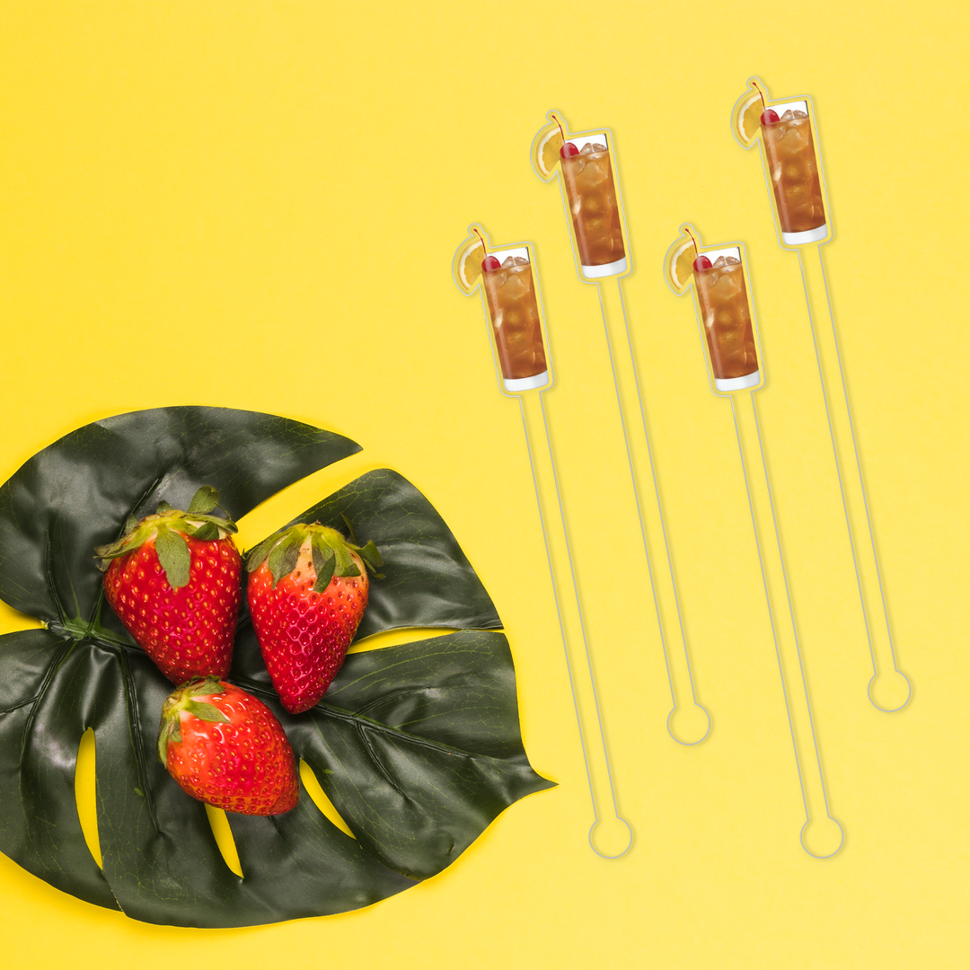 Rum Breeze swizzle stick set in styled cocktail drink on home bar or entertaining setup.